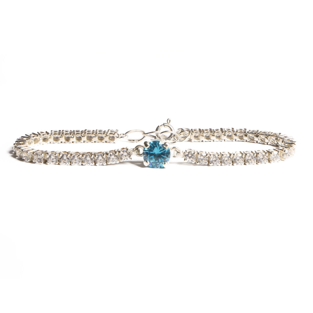Elegant Silver Tennis Bracelet with Blue Crystal Centerpiece